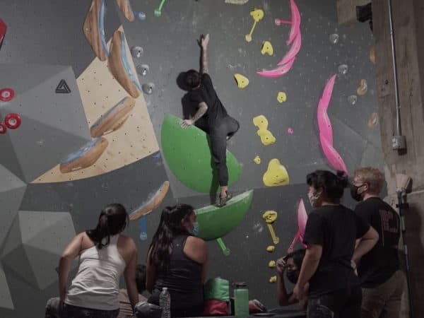 Man rock climbing indoor