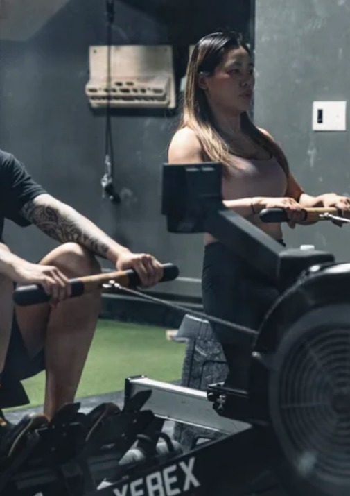 Member on a rowing machine